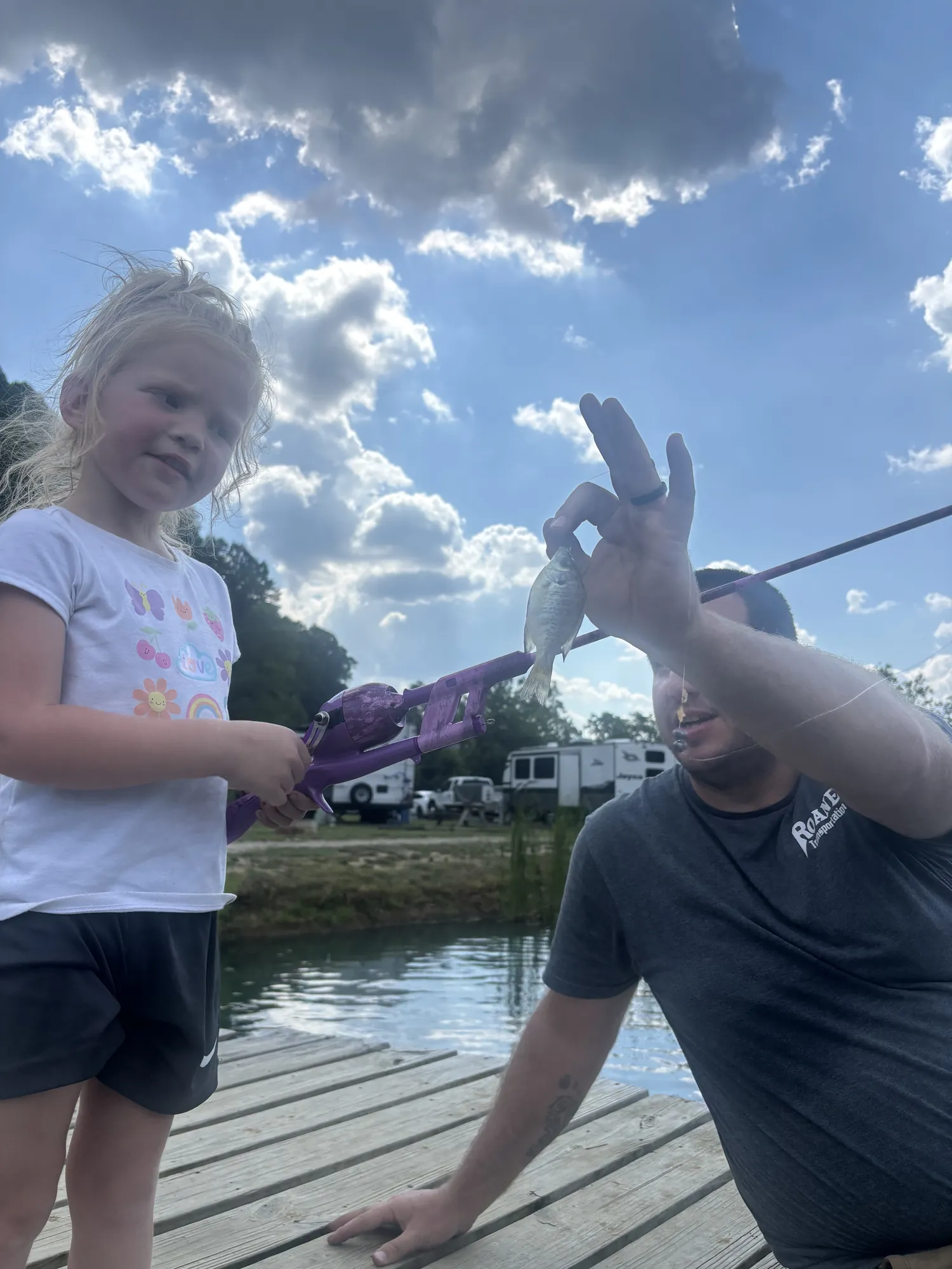 Family fishing from the dock